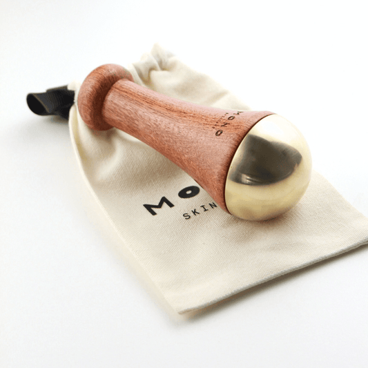 Accessoire Kansa MONO en bronze naturel pour massage facial revitalisant