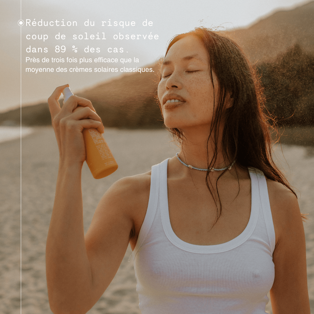 Femme qui applique la brume protectrice sur le visage. bienfaits de la brume affichés sur l'image