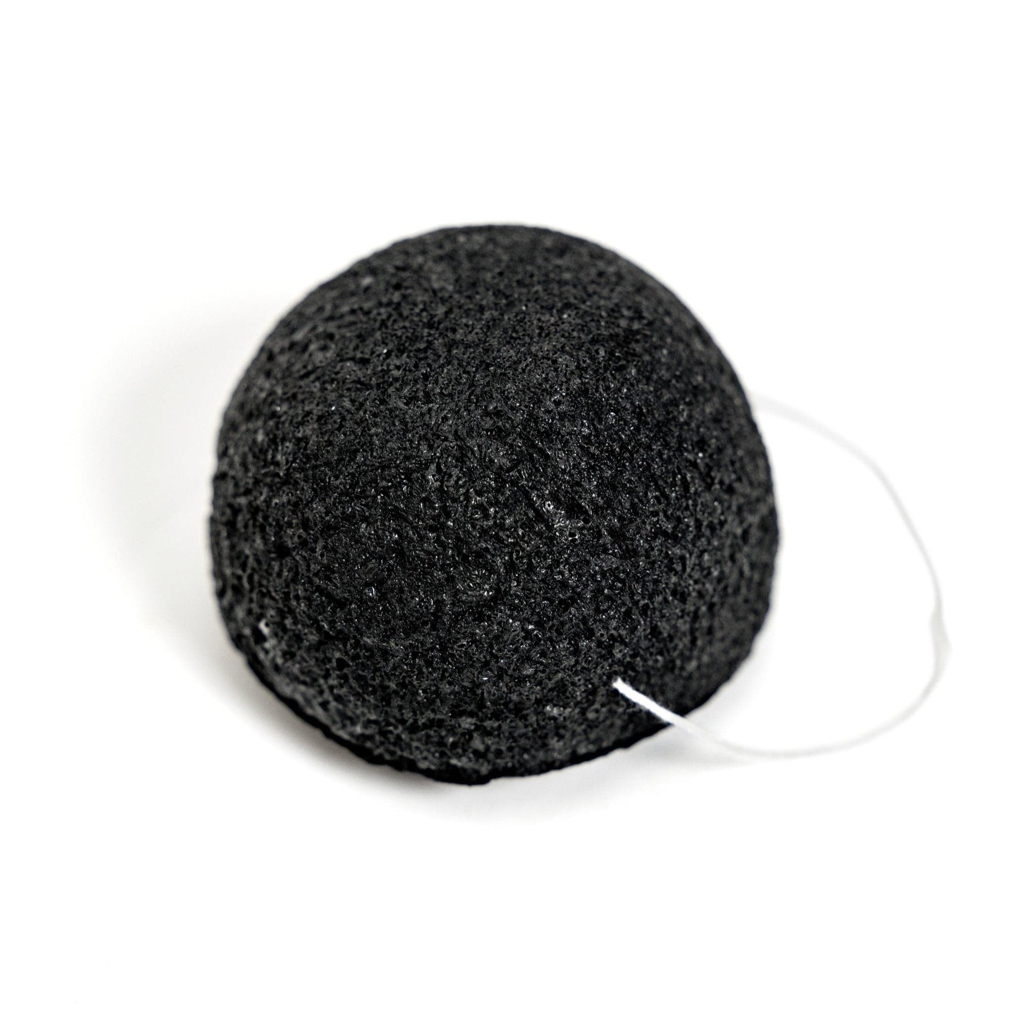 Éponge visage MONO infusée au charbon naturel pour un nettoyage purifiant et doux